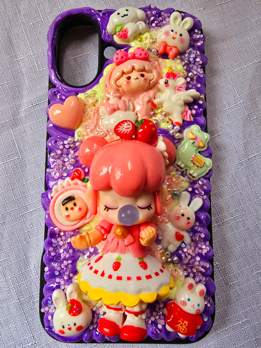 A handmade pink and purple iPhone 16 plus phone case