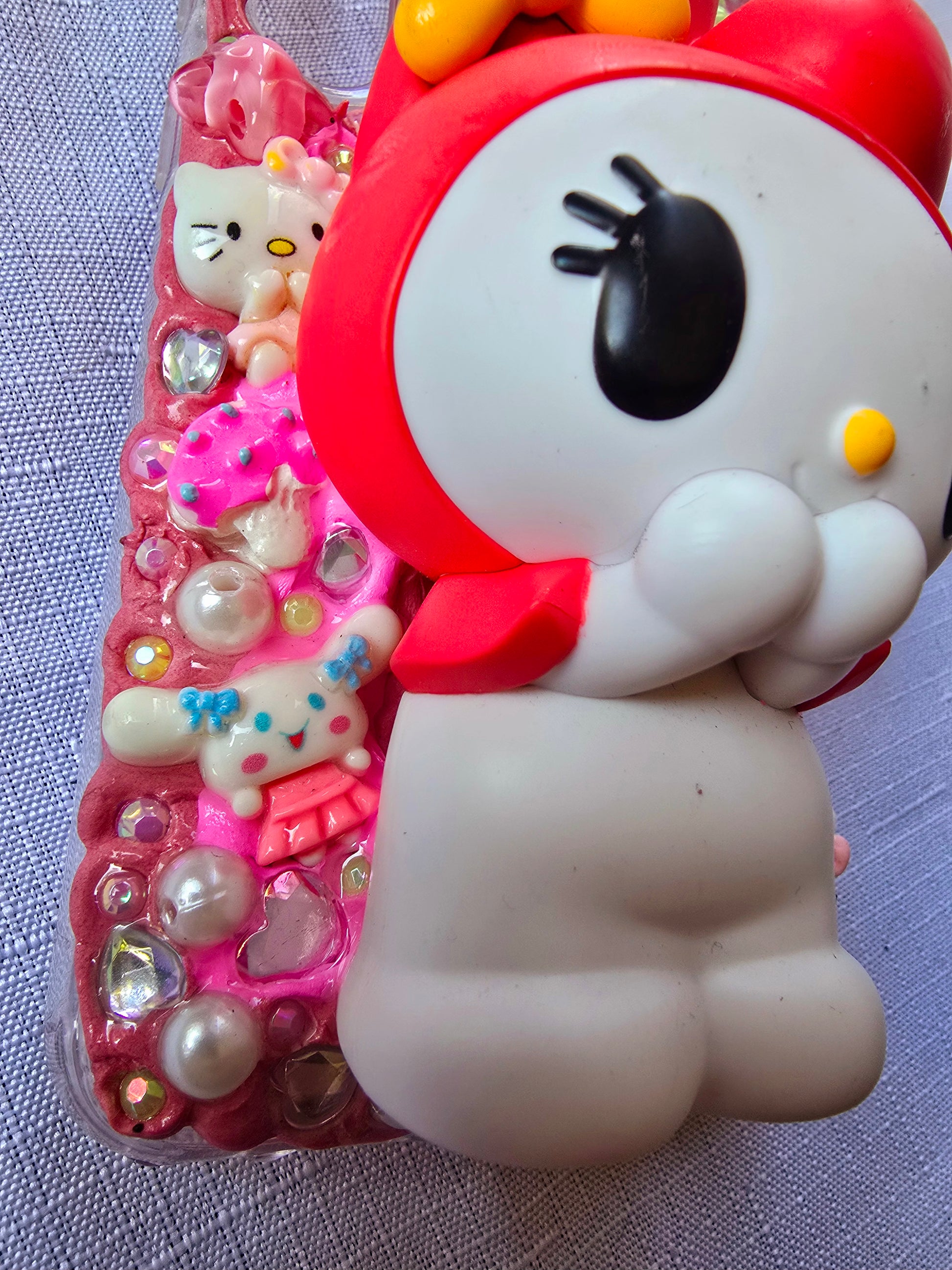 Handmade Samsung S23 Plus phone case featuring a My Melody theme in pink, white, and yellow with cute 3D decorations and kawaii charm accents.