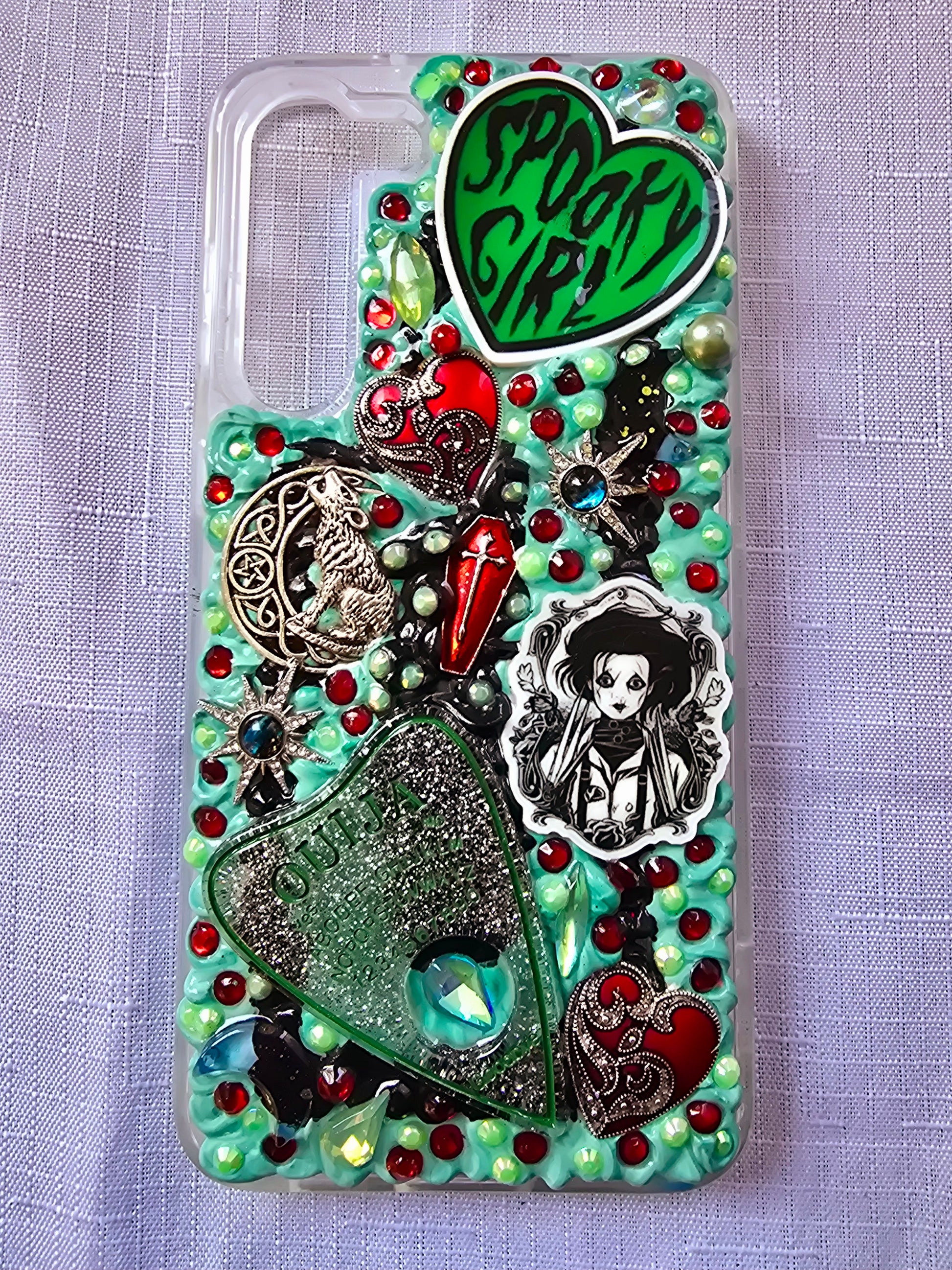Handmade horror and witchy-themed Samsung S23 Plus phone case in green, red, and black