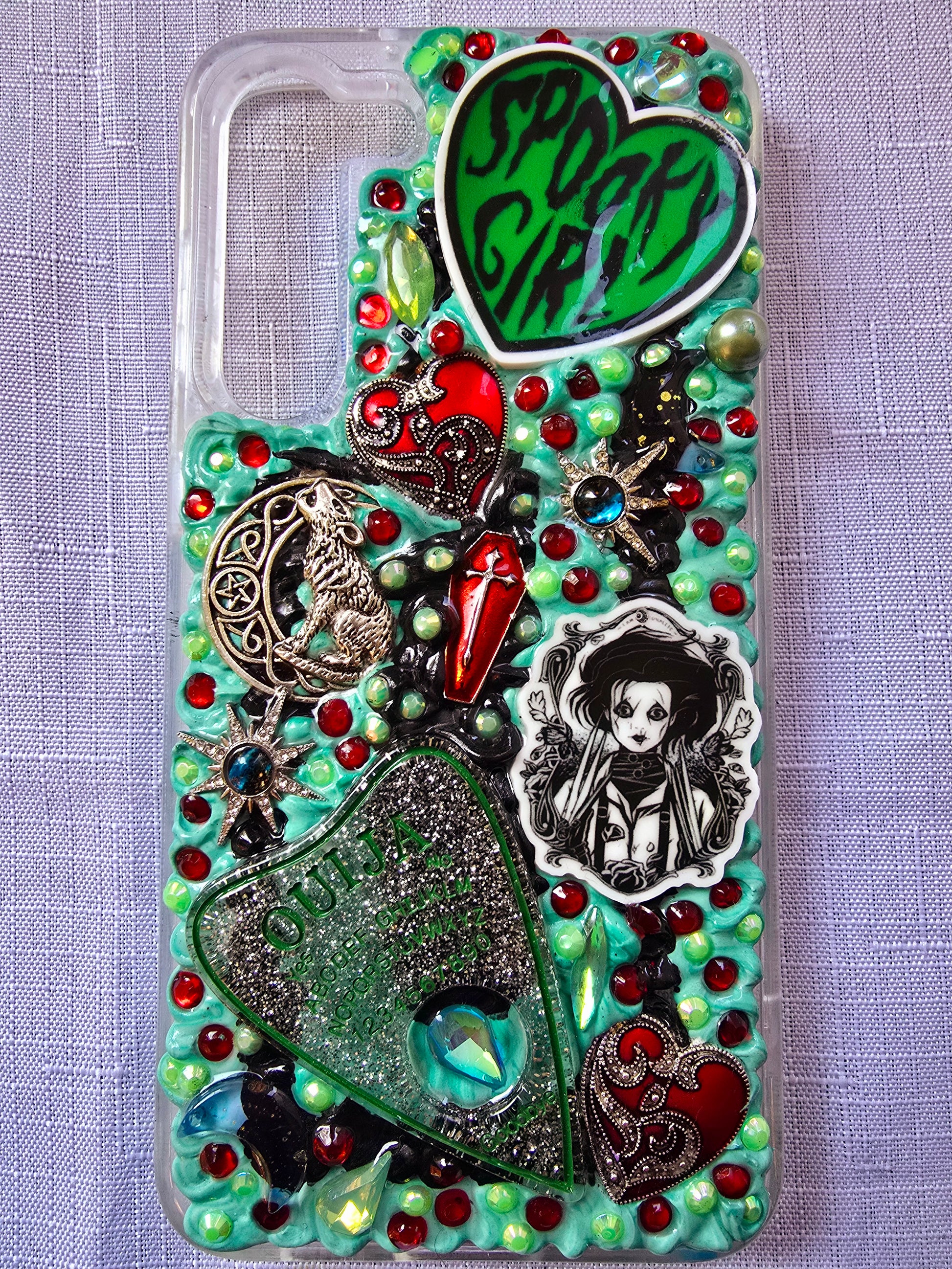 Handmade horror and witchy-themed Samsung S23 Plus phone case in green, red, and black