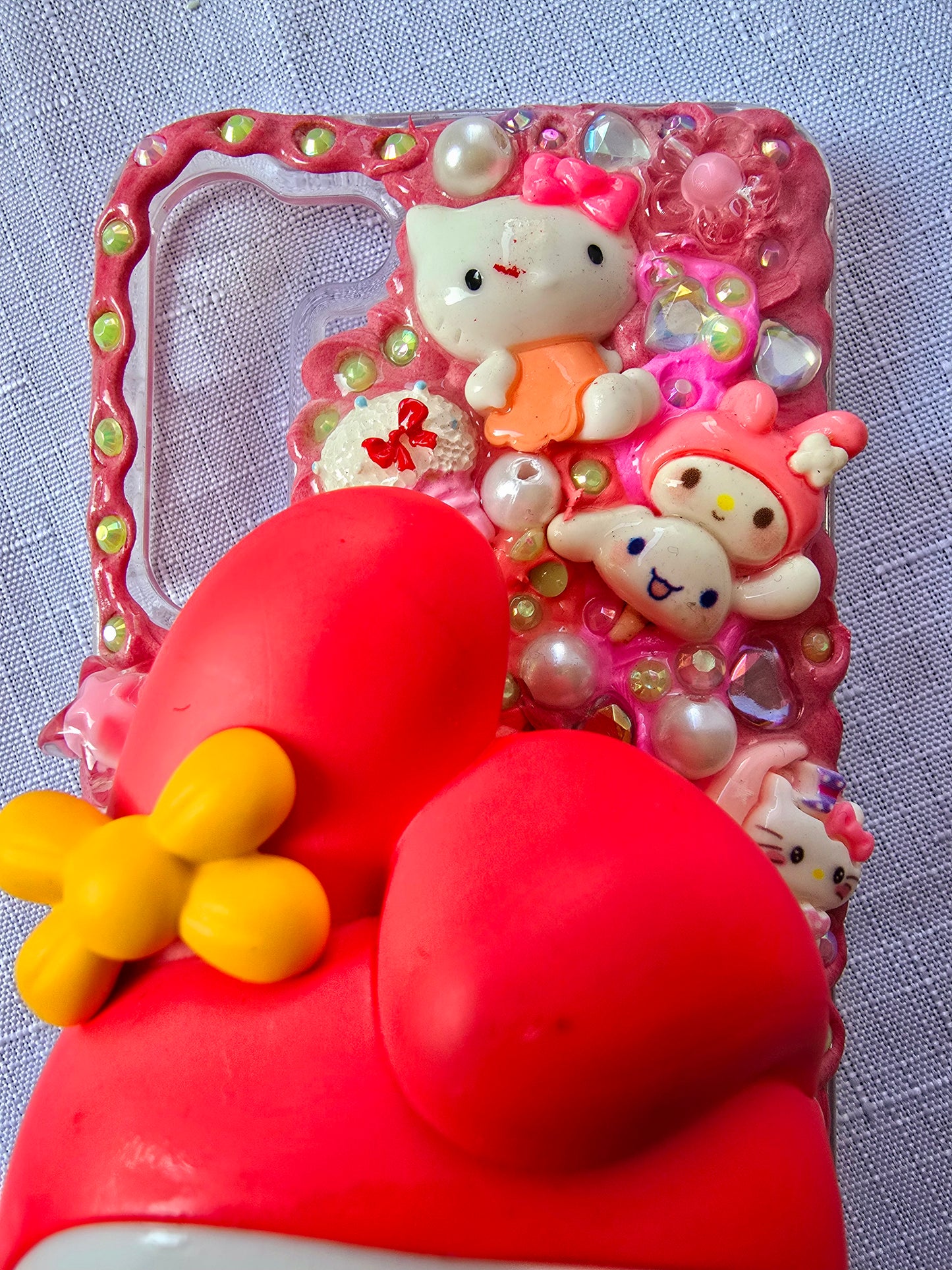 Handmade Samsung S23 Plus phone case featuring a My Melody theme in pink, white, and yellow with cute 3D decorations and kawaii charm accents.