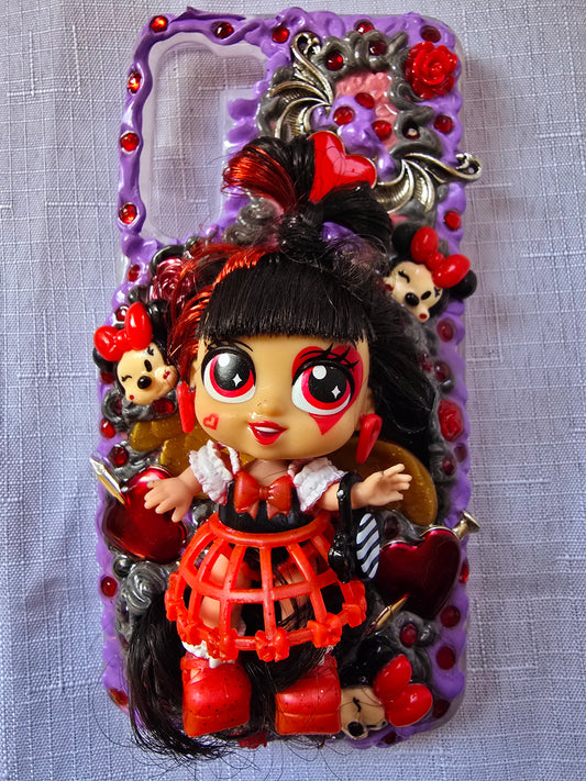 Handmade Samsung S23 Plus phone case with gothic and doll-inspired design, featuring red and black accents, heart charms, and 3D figure on a purple base.