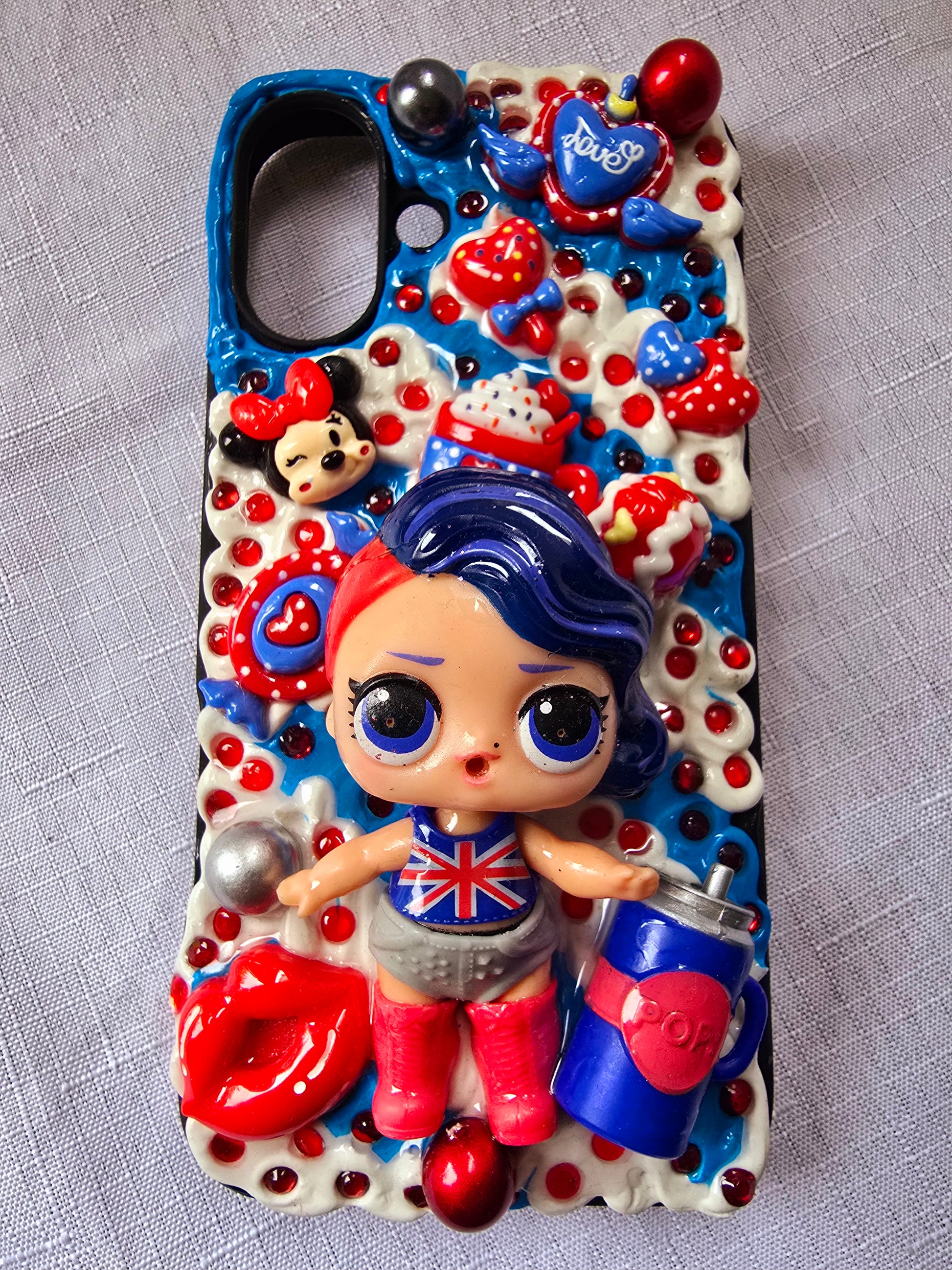 A handmade red and blue iPhone 16 plus phone case
