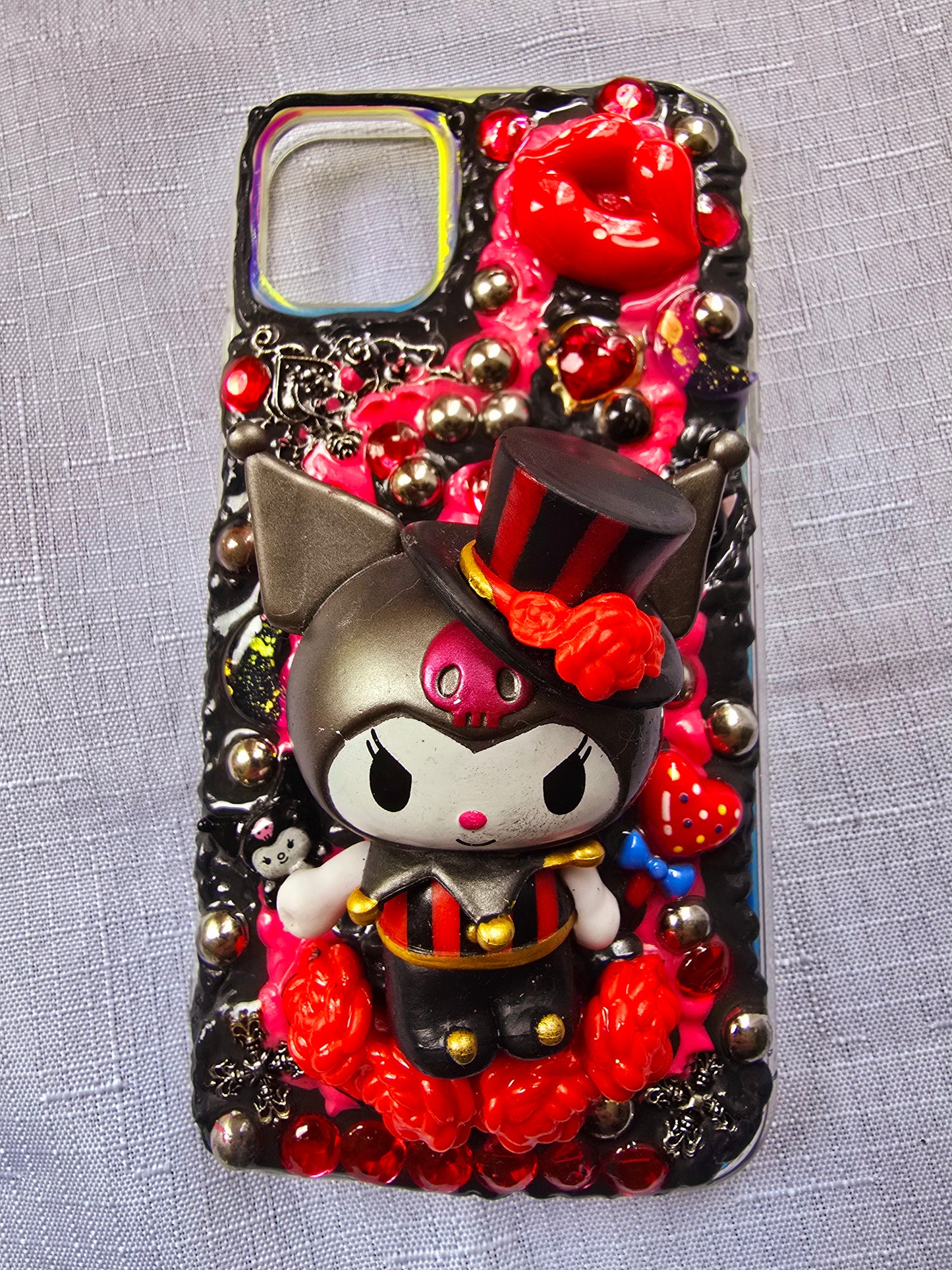 Handmade iPhone 11 phone case inspired by Kuromi in red and black colors – cute, edgy, and perfect for Sanrio fans.